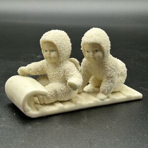 Department 56 Snowbabies “down the hill we go” sledding figurine, winter